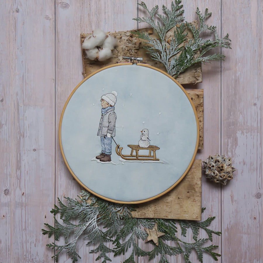 Stickdatei Junge im Schnee